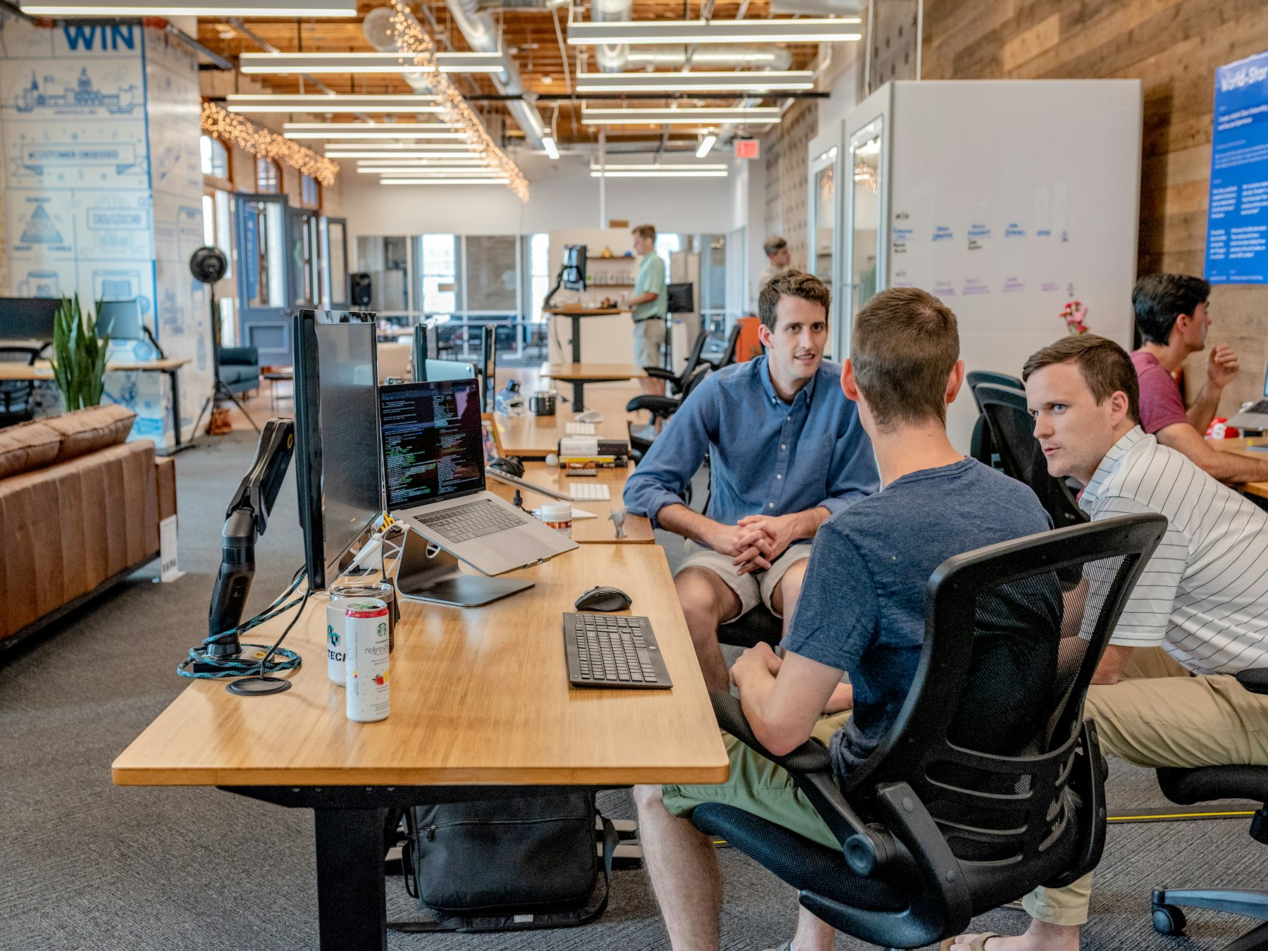 People working together in a bright shared office space