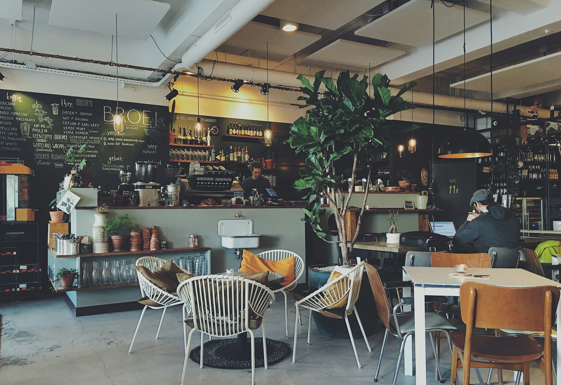 Interior of an independent café with a chalkboard menu